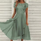 Robe élégante à col rond pour femme