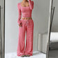 Ensemble haut ajusté en maille rayée et pantalon large