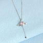 Collier ailes d’ange roses