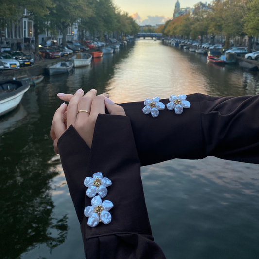 Cache-boutons en forme de fleur