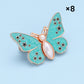 Bouton en forme de papillon qui s'adapte parfaitement