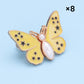 Bouton en forme de papillon qui s'adapte parfaitement