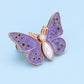 Bouton en forme de papillon qui s'adapte parfaitement